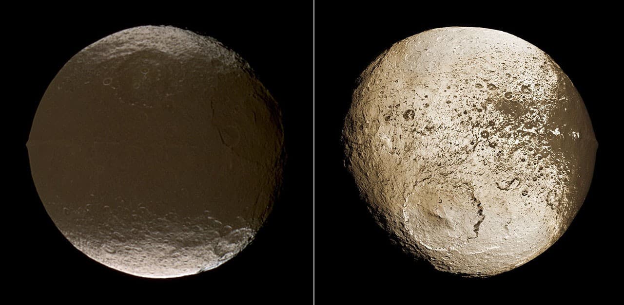 Cassini paired global views of Iapetus, showing a charcoal-dark leading hemisphere and snow-bright trailing terrain.