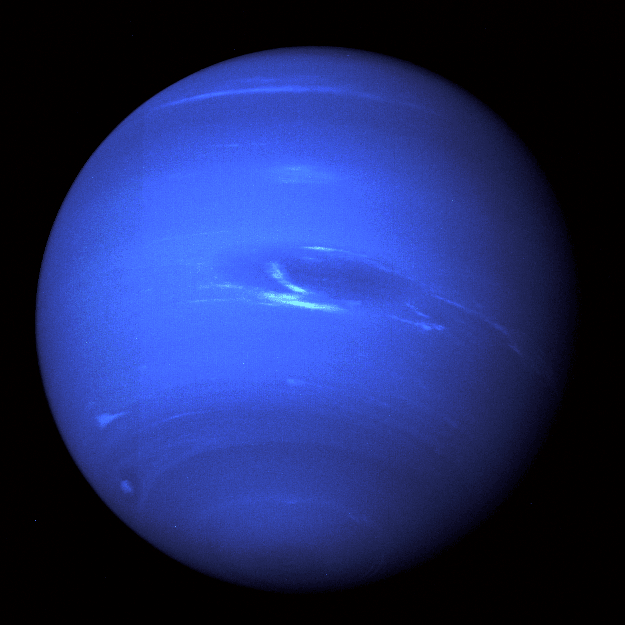 A processed Voyager 2 portrait of Neptune as a blue sphere with pale cloud bands and bright high clouds.